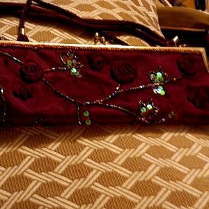 Valerie Steven's,  small formal clutch. Eggplant color with beautiful sequins